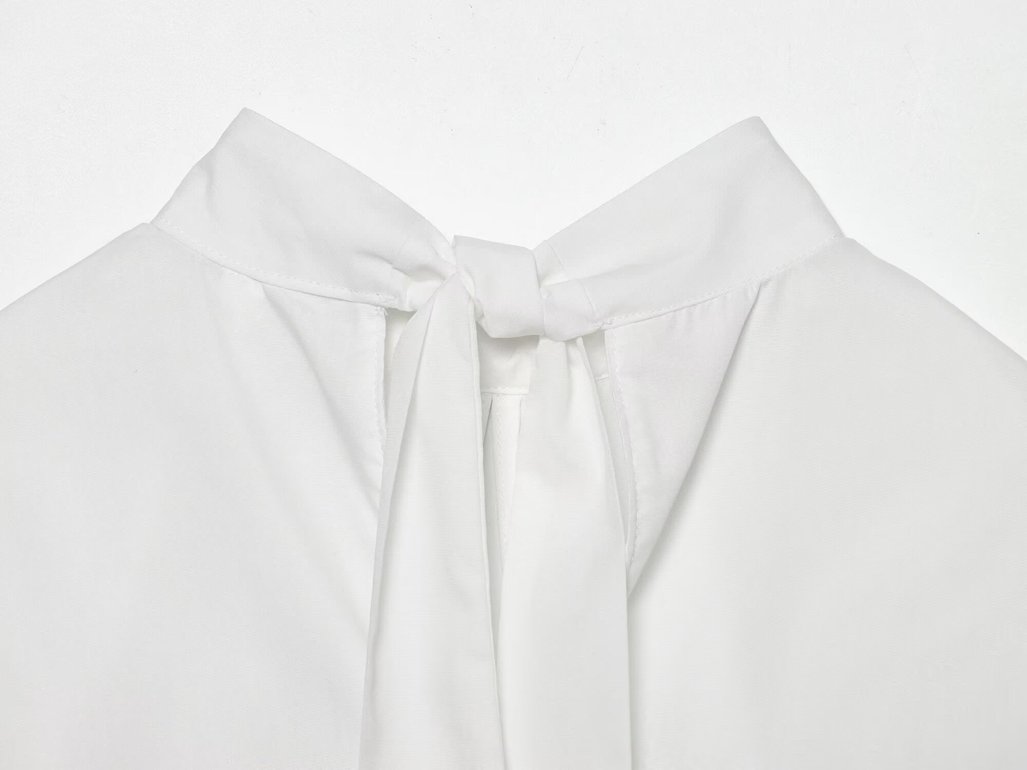Women's bow decorated Split poplin top