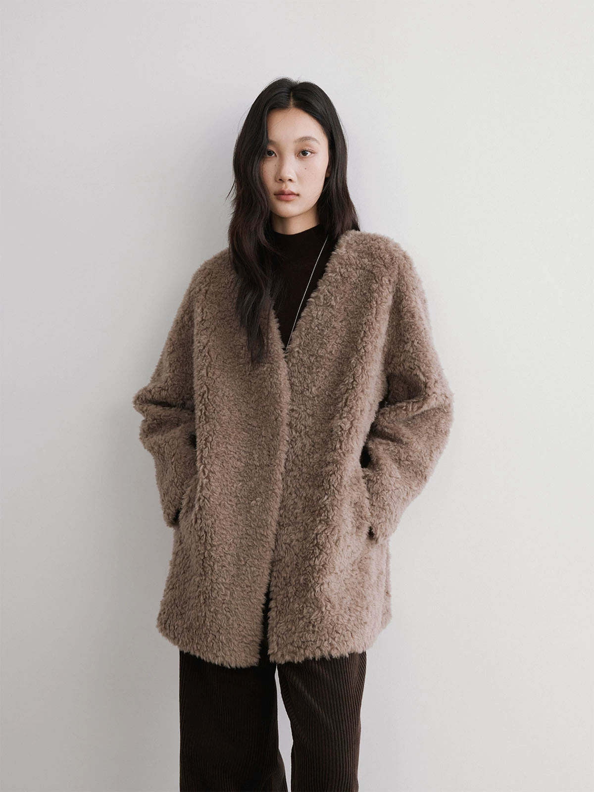 The rumah wool collarless coat, high-end imitation fur integrated coat, new in autumn and winter