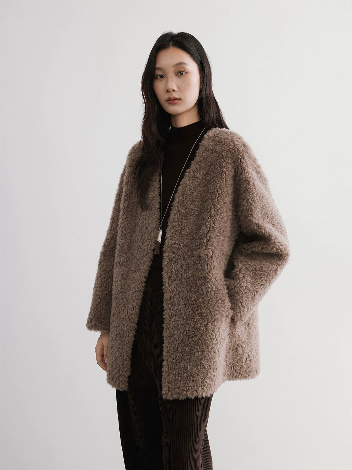 The rumah wool collarless coat, high-end imitation fur integrated coat, new in autumn and winter